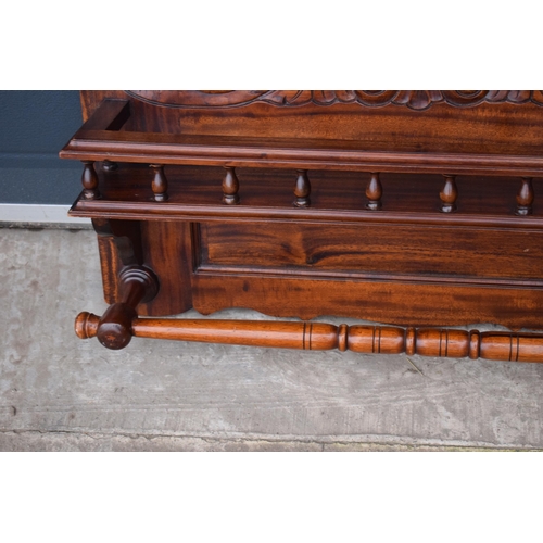 404 - An early 20th century wooden shelving unit / spice shelf with carved decoration and turned features.... 