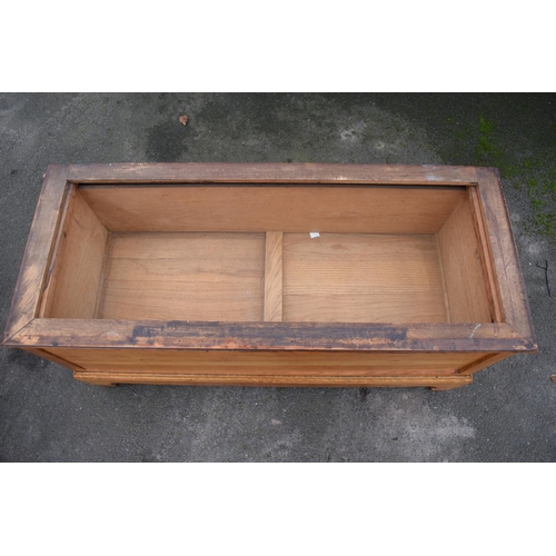 410 - An early 20th century blanket box with detachable lid made from the base of a wardrobe with sliding ... 