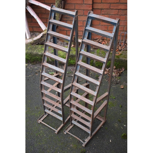 412 - A pair of vintage metal car ramps. 101cm long.