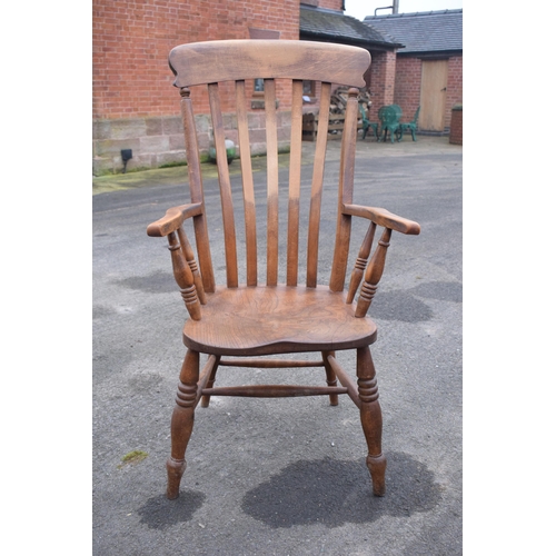 415 - Victorian high-backed farmhouse chair. 115cm tall. 

In good functional condition with some scratche... 