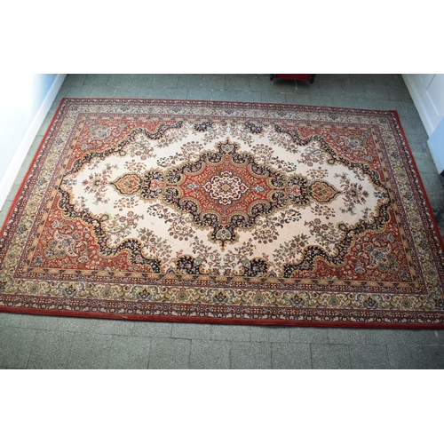 423 - A large 20th century rectangular carpet. 307 x 199cm. in good condition generally with some stains a... 