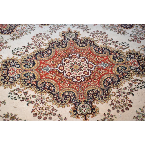 423 - A large 20th century rectangular carpet. 307 x 199cm. in good condition generally with some stains a... 