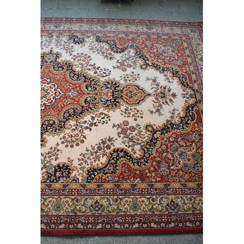 423 - A large 20th century rectangular carpet. 307 x 199cm. in good condition generally with some stains a... 