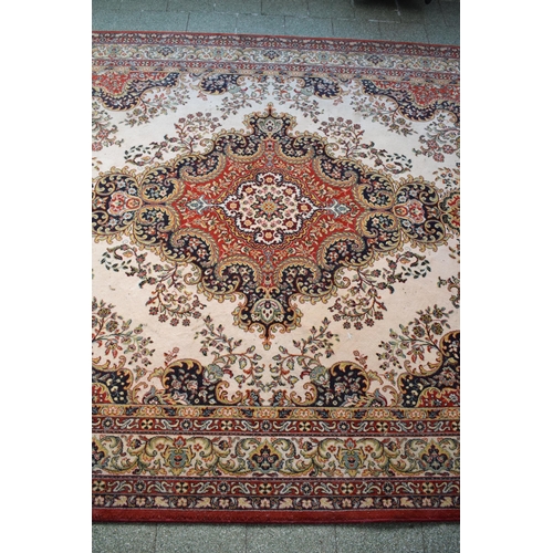 423 - A large 20th century rectangular carpet. 307 x 199cm. in good condition generally with some stains a... 