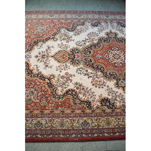 423 - A large 20th century rectangular carpet. 307 x 199cm. in good condition generally with some stains a... 