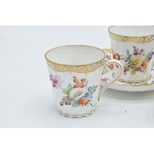 62 - A collection of Dresden fine bone china to include a pair of cups and saucers together with 3 cups a... 