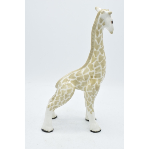 67 - Midwinter large pottery model of a giraffe. 30cm tall. In good condition with no obvious damage or r... 