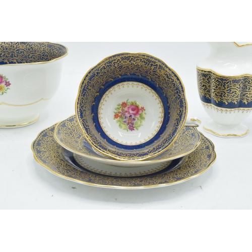 77 - George Jones Crescent China part tea set to include 6 cups, 6 saucers, 6 sides (6 trios), a sugar bo... 