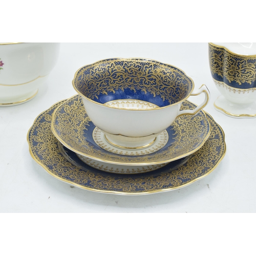 77 - George Jones Crescent China part tea set to include 6 cups, 6 saucers, 6 sides (6 trios), a sugar bo... 