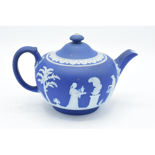 83 - Wedgwood 19th century dip blue jasperware teapot. 22cm long. In good condition with no obvious damag... 