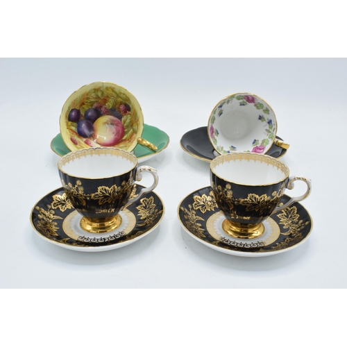 85 - A collection of tea ware to include cups and saucers such as Aynsley Orchard gold, a similar Aynsley... 