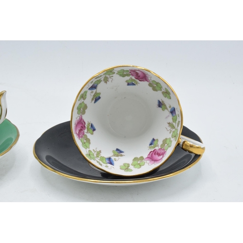 85 - A collection of tea ware to include cups and saucers such as Aynsley Orchard gold, a similar Aynsley... 