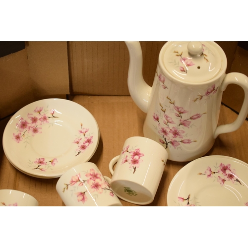 89 - A Hammersley part coffee set decorated with a pink floral scene to include a coffee pot, 6 coffee ca... 