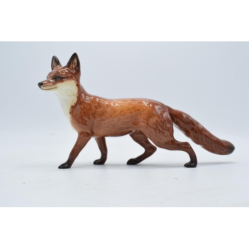 148E - Beswick large standing fox with black tail end 1016. In good condition with no obvious damage or res... 