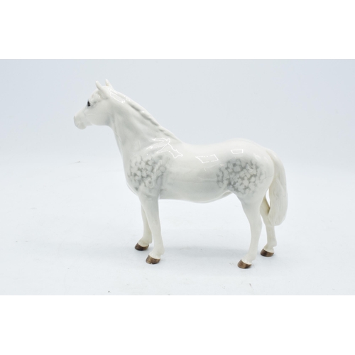 148H - Beswick grey Connemara pony 1641. In good condition with no obvious damage or restoration. Minor gra... 