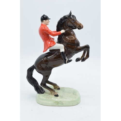 148P - Beswick rearing huntsman on brown horse 868. In good condition with no obvious damage or restoration... 