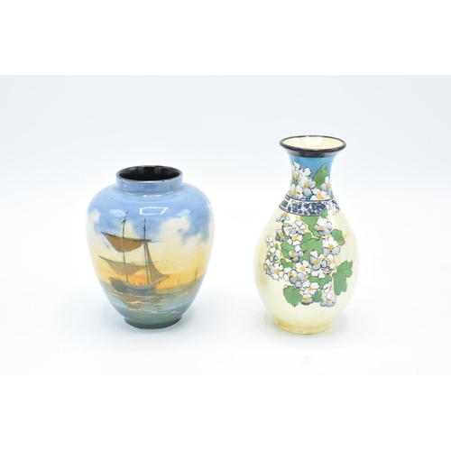 101 - Royal Doulton series ware vases, one with a floral scene, the other one with tall ships (2). In good... 