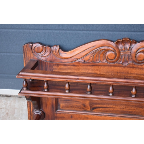 302 - An early 20th century wooden shelving unit / spice shelf with carved decoration and turned features.... 