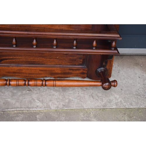 302 - An early 20th century wooden shelving unit / spice shelf with carved decoration and turned features.... 