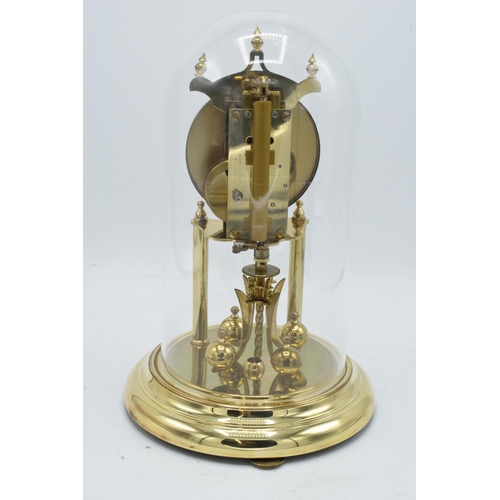 30 - A 20th century anniversary clock with dome made by Kieninger & Obergfell with key. Appears to be in ... 