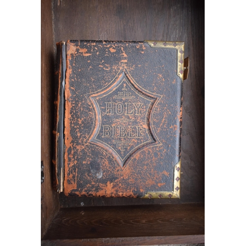 305 - A late 18th / 19th century oak bible box raised on cabriole style legs with heavy carved decoration ... 