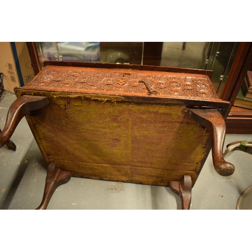 305 - A late 18th / 19th century oak bible box raised on cabriole style legs with heavy carved decoration ... 