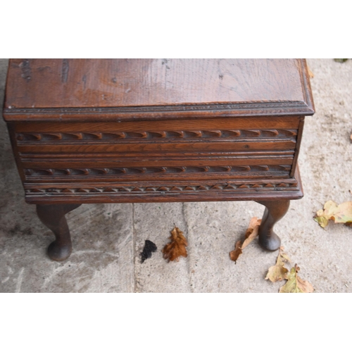 305 - A late 18th / 19th century oak bible box raised on cabriole style legs with heavy carved decoration ... 