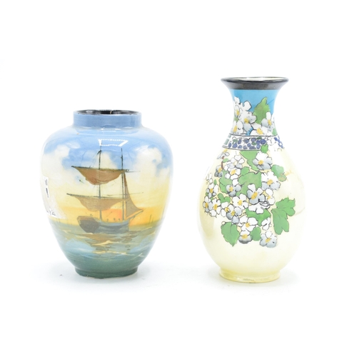 101 - Royal Doulton series ware vases, one with a floral scene, the other one with tall ships (2). In good... 