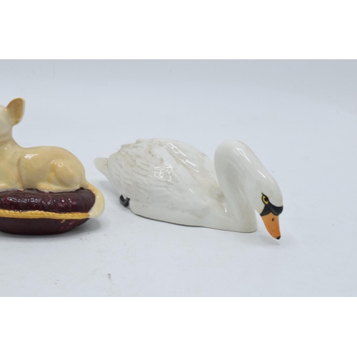 105 - A collection of Beswick to include a koala bear 1038, chihuahua on cushion 2454 and swan with head d... 