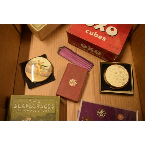 12 - A mixed collection of items to include a vintage Oxo tin, coin set, Stratton compacts, 'Two Scapegra... 