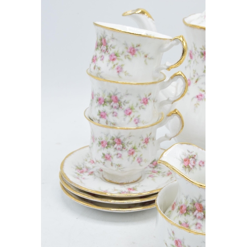 18 - A Paragon coffee set in the Victoriana Rose design to include a coffee pot, 6 coffee cups, 6 saucers... 