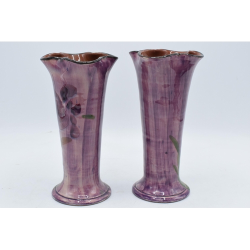 2 - A pair of studio artist's vases depicting butterflies amongst foliage (2). 20cm tall. In good condit... 