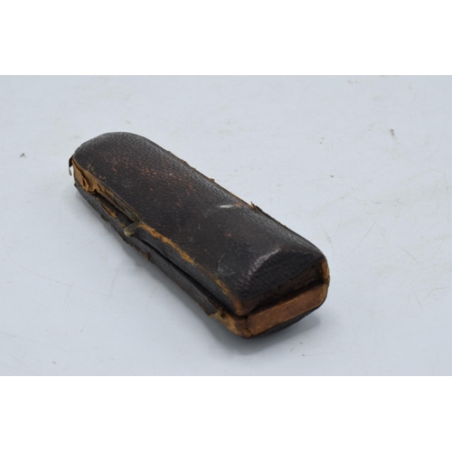 208 - A cased cheroot / cigarette holder with 2 silver collars.