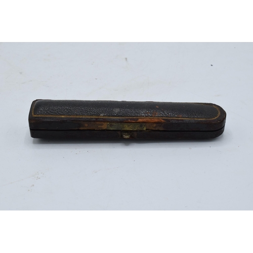 209 - A cased cheroot holder with a 15ct gold mount / collar.