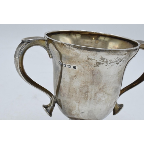 211 - A silver trophy, Sheffield 1931. 122.3 grams. Inscription to front 'Exchange Golf Cup T H Breakell 1... 