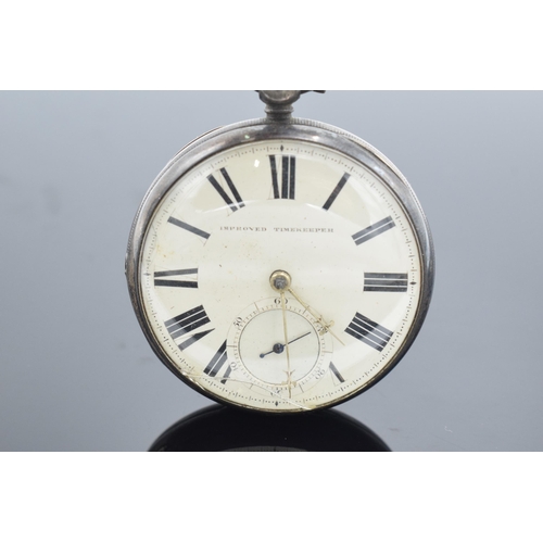 215 - A silver cased key-wind pocket watch 'Improved Timekeeper'. Untested. Small crack to the glass.