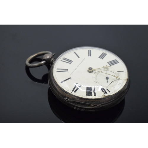 215 - A silver cased key-wind pocket watch 'Improved Timekeeper'. Untested. Small crack to the glass.