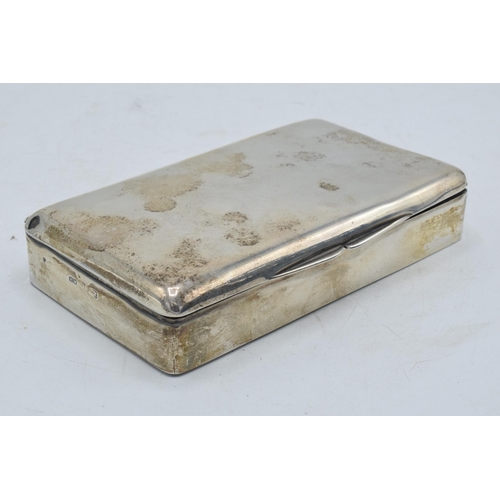 220 - A silver cigarette box with wooden lining. 14 x 8 x 3cm. In clean condition with some scratches and ... 