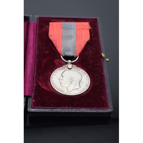 225 - A cased George V 'For Faithful Service' medal awarded to Harry Nicholas Hillier.