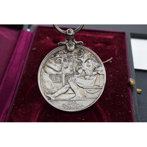 225 - A cased George V 'For Faithful Service' medal awarded to Harry Nicholas Hillier.