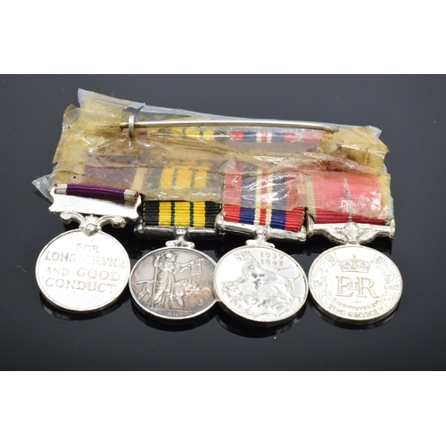 226 - A set of 4 miniature medals with ribbons to include Queen Elizabeth Kenya medal, QEII Regular Army m... 