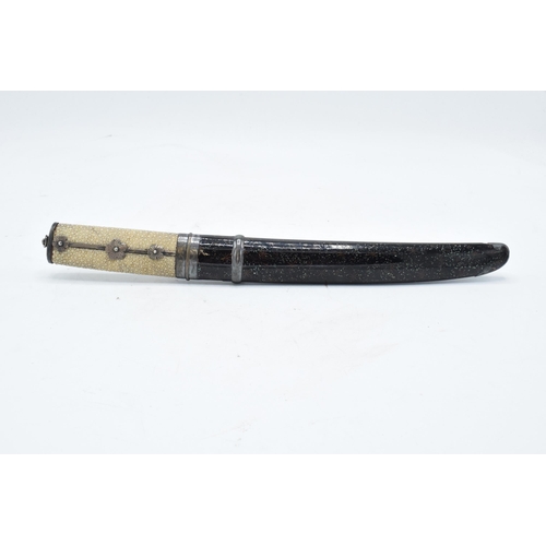 A Japanese Tanto with shagreen handle and metal mounts. 29cm long. Length of blade 17cm.