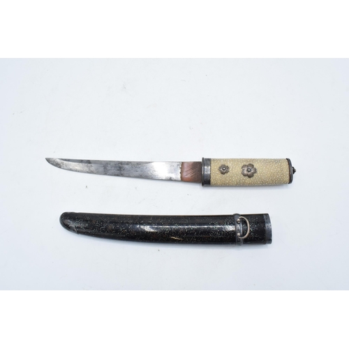 227 - A Japanese Tanto with shagreen handle and metal mounts. 29cm long. Length of blade 17cm.