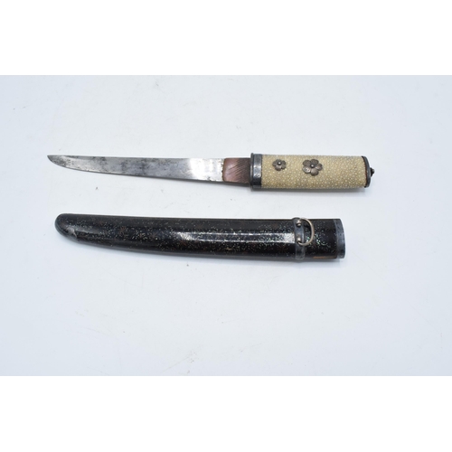 227 - A Japanese Tanto with shagreen handle and metal mounts. 29cm long. Length of blade 17cm.