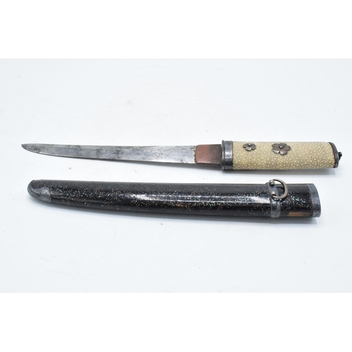 227 - A Japanese Tanto with shagreen handle and metal mounts. 29cm long. Length of blade 17cm.