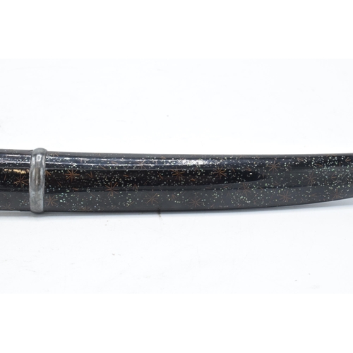 227 - A Japanese Tanto with shagreen handle and metal mounts. 29cm long. Length of blade 17cm.