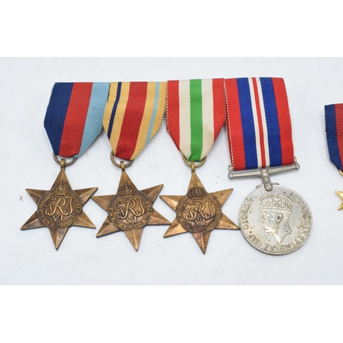 228 - A collection of World War II (WW2) medals to include The 1939-1945 Star, The Africa Star, The Italy ... 