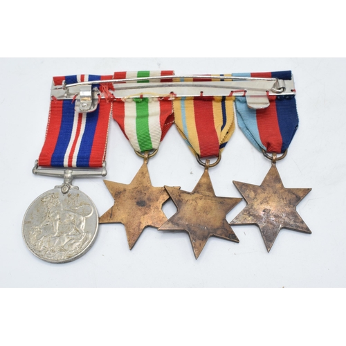 228 - A collection of World War II (WW2) medals to include The 1939-1945 Star, The Africa Star, The Italy ... 