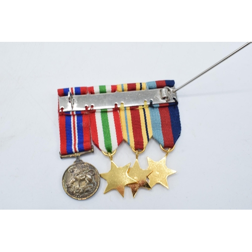 228 - A collection of World War II (WW2) medals to include The 1939-1945 Star, The Africa Star, The Italy ... 