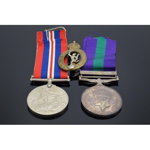 232 - A collection of militaria to include George VI silver Palestine 1945-48 medal and ribbon awarded to ... 